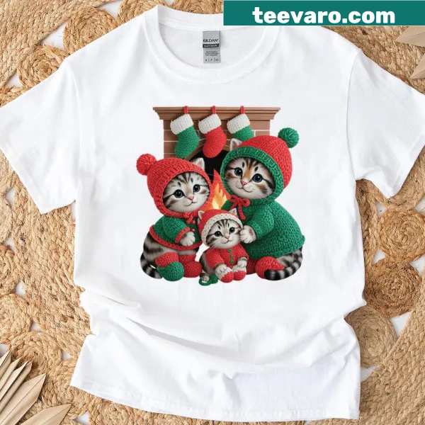 Cute t-shirt featuring a family of kittens in a cozy Christmas setting