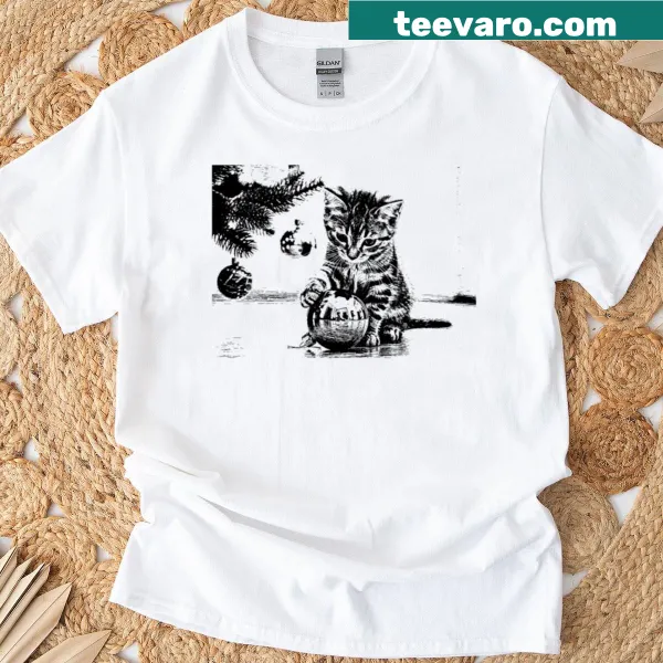 Vintage oversized t-shirt featuring a kitten ornament on a Christmas tree