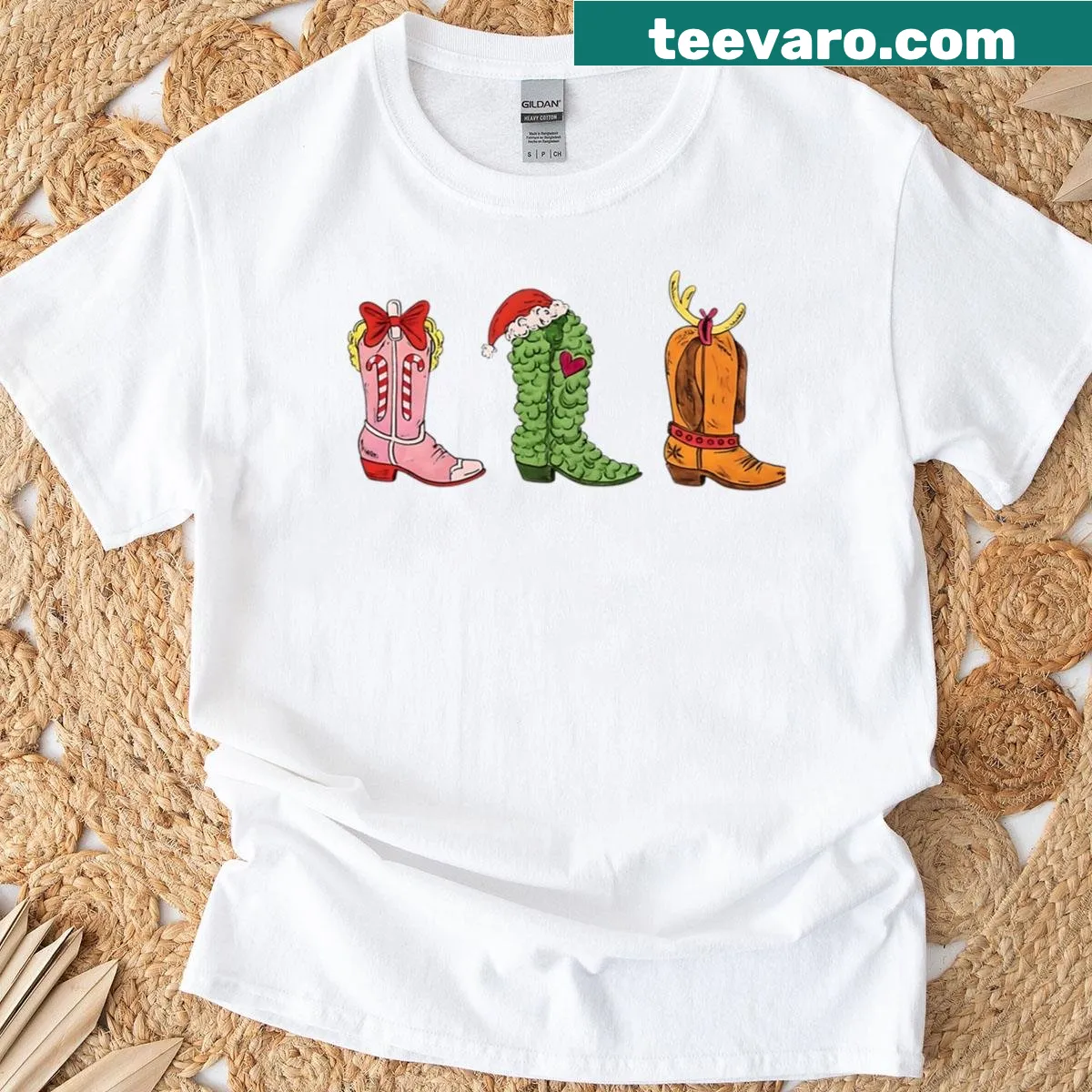 Oversized t-shirt with three illustrated western boots for Christmas — on a men's t-shirt