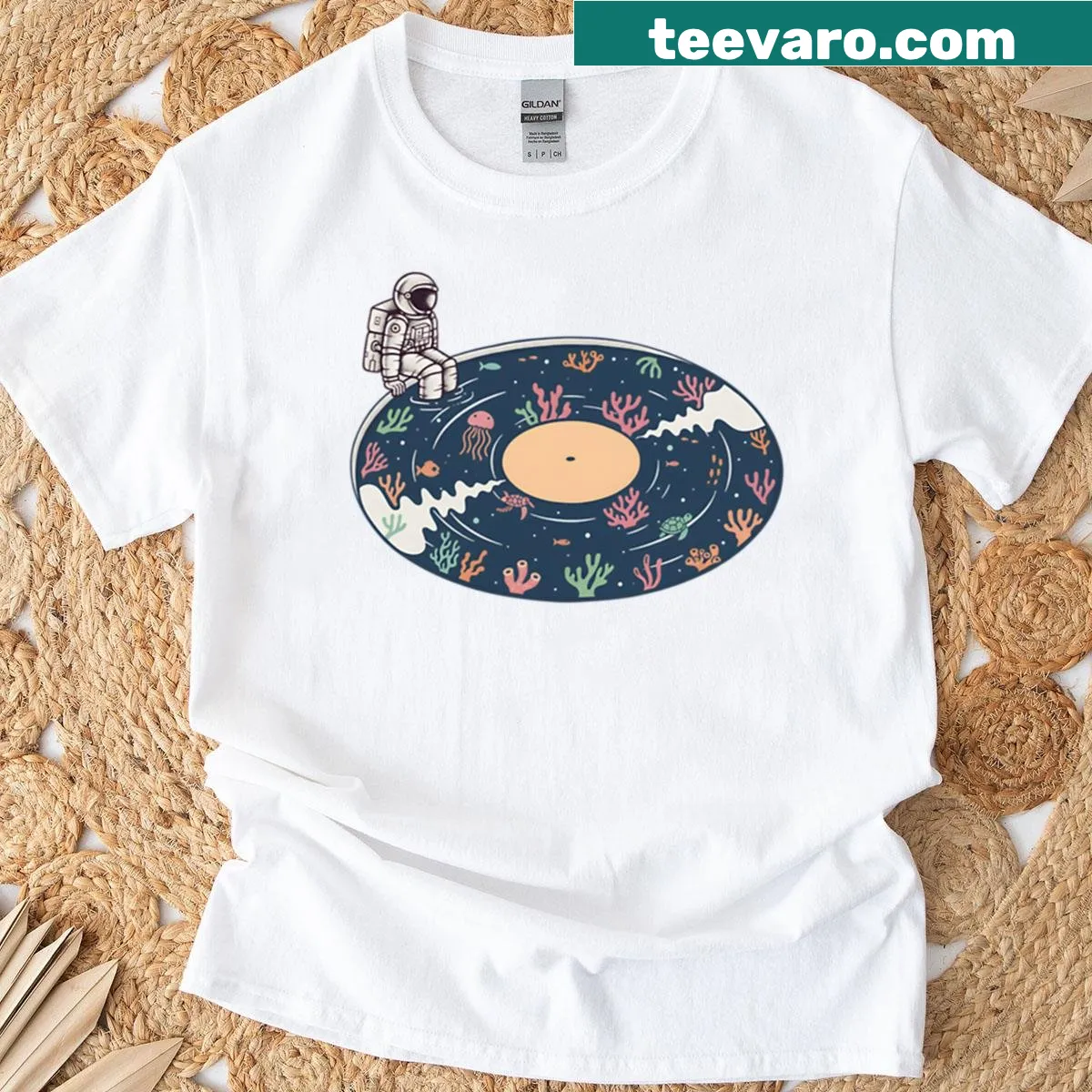 Cosmic-themed t-shirt with musical elements illustrated. — on a men's t-shirt