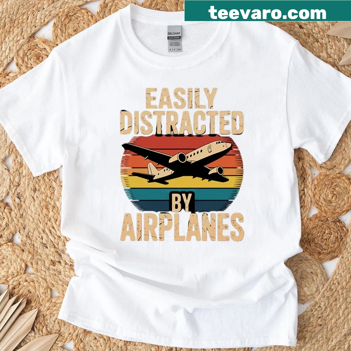 Typography graphic stating 'Easily Distracted By Airplanes' on a t-shirt — on a men's t-shirt