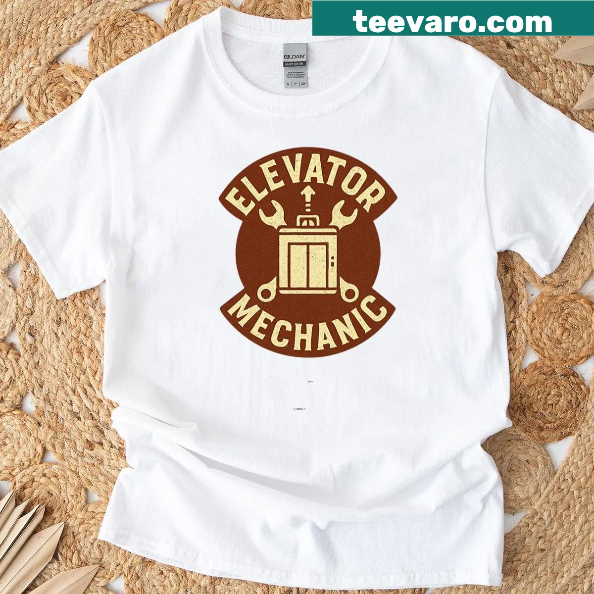 Vintage badge design for elevator mechanics on a T-shirt — on a men's t-shirt
