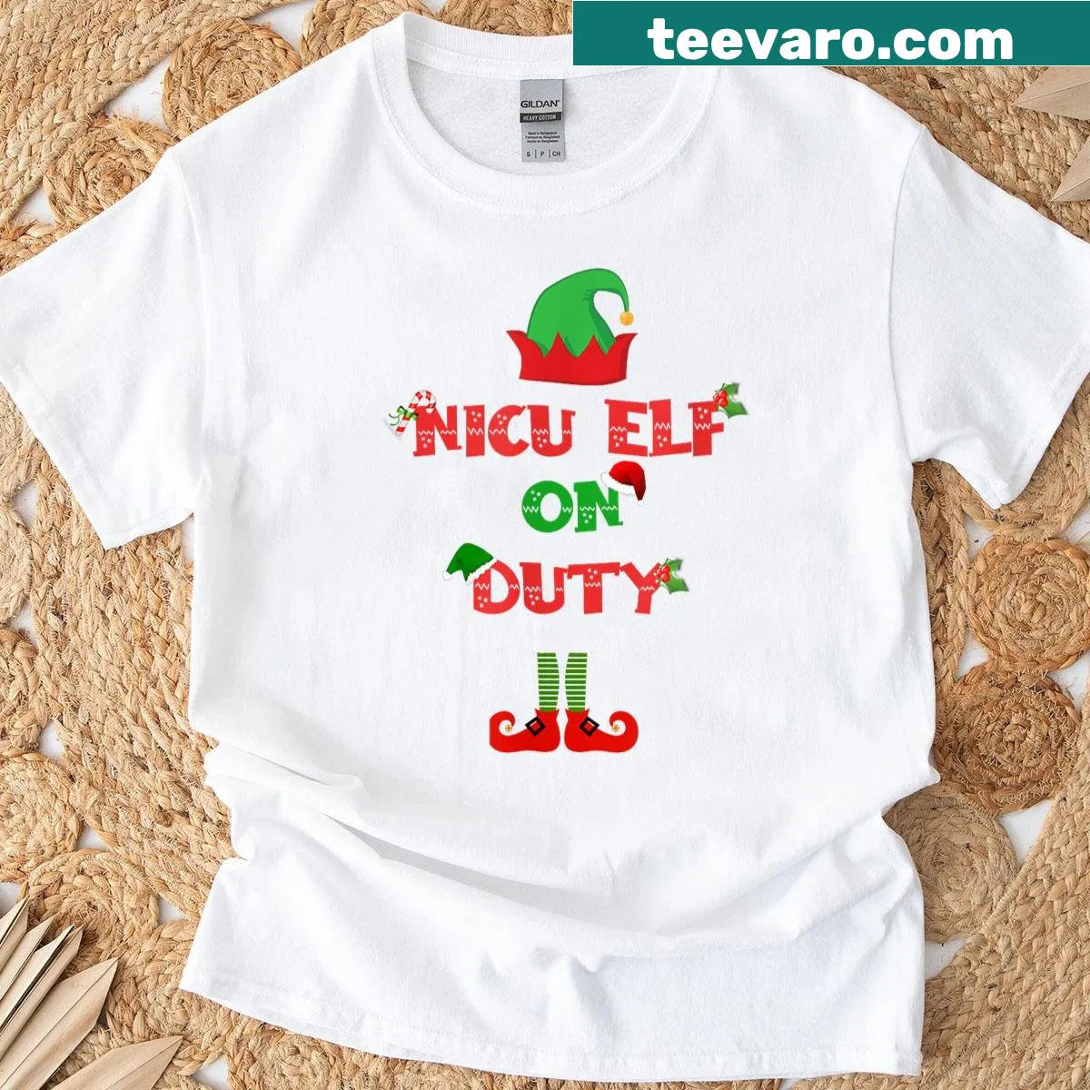 Cute 'Elf On Duty' graphic on NICU nurse T-shirt — on a men's t-shirt