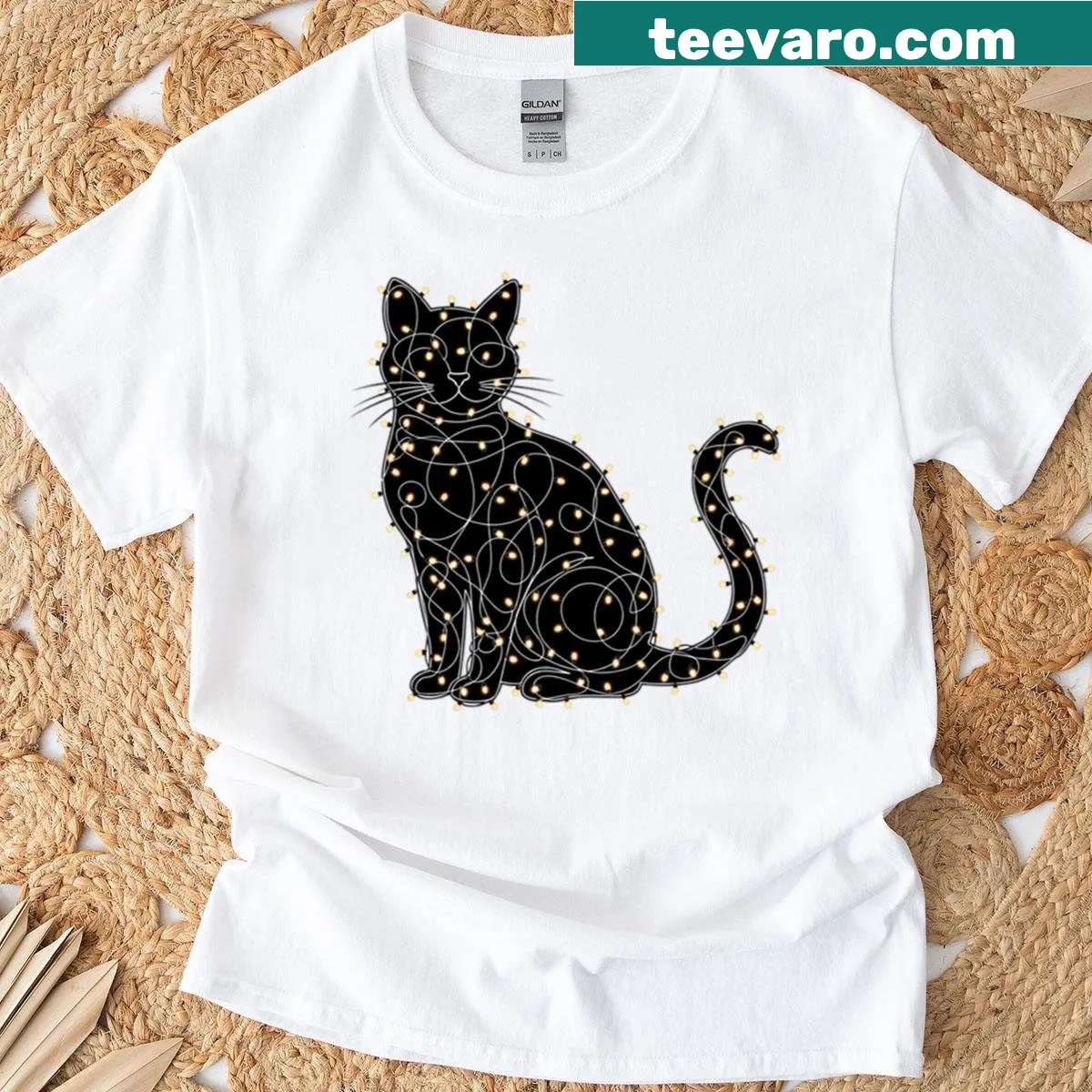 Black cat silhouette tangled in colorful Christmas lights — on a men's t-shirt