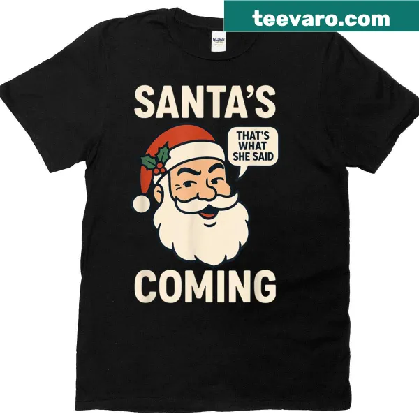 Humorous T-shirt featuring Santa and the phrase 'Santa's Coming, That's What She Said'