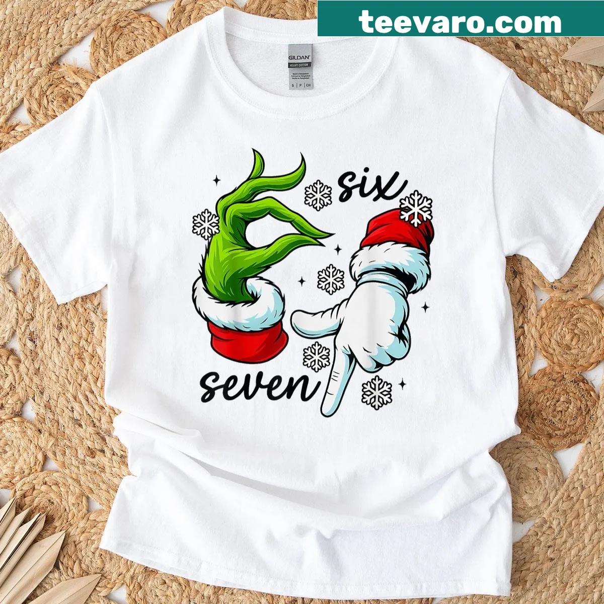 Funny Christmas T-shirt featuring an elf hand and the 67 meme — on a men's t-shirt