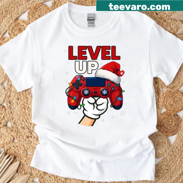 Gamer Christmas t-shirt with a Santa hat on a gaming controller