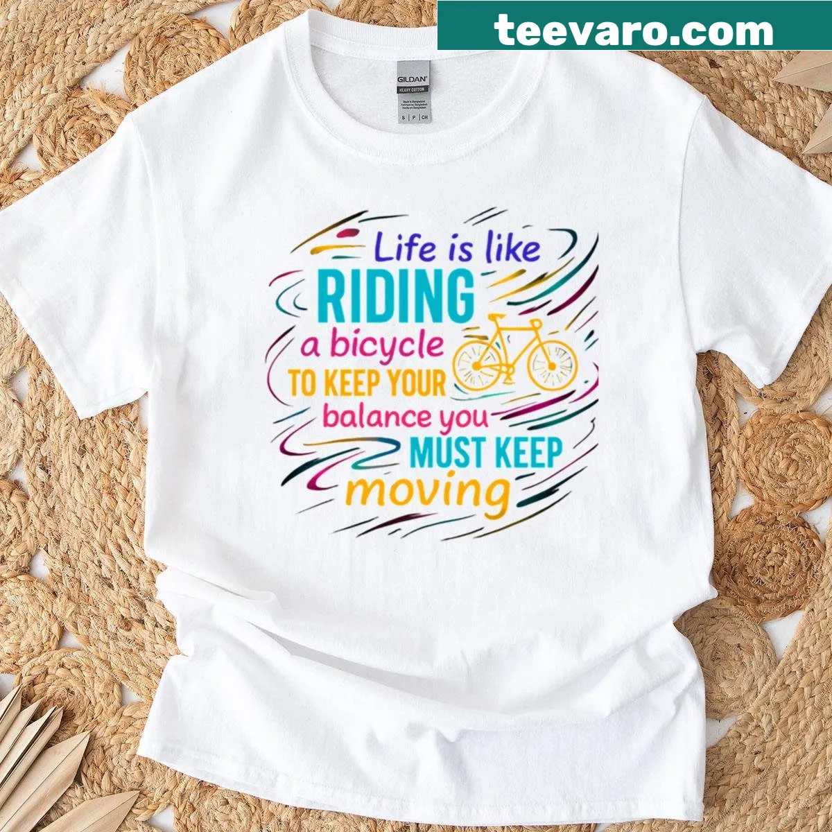 Minimalist bicycle graphic with the phrase 'Life Is Like Riding A Bicycle' — on a men's t-shirt