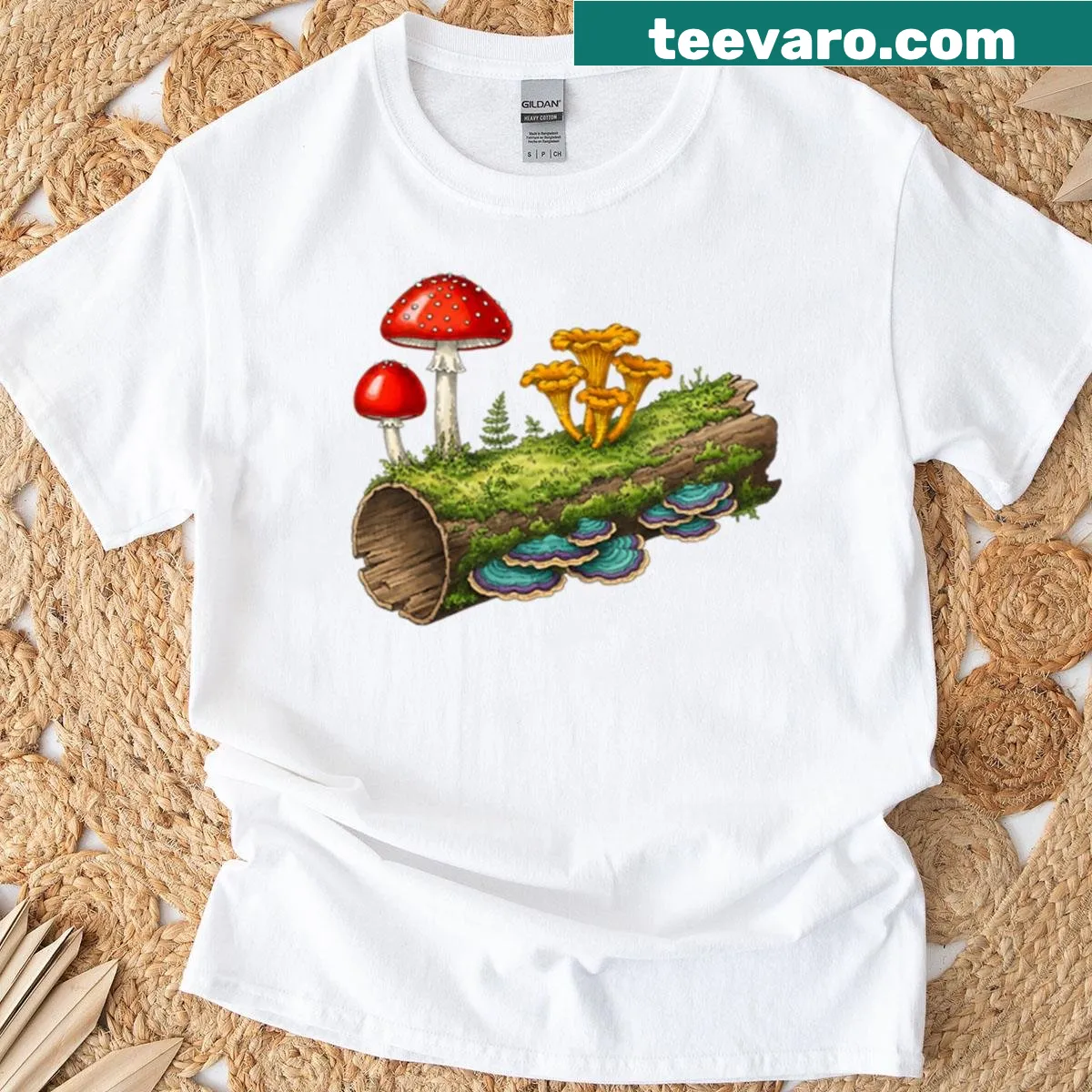 Oversized t-shirt featuring a fantasy fungi illustration on a log — on a men's t-shirt