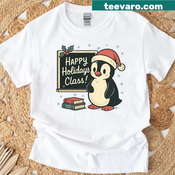 Christmas t-shirt featuring playful penguin design