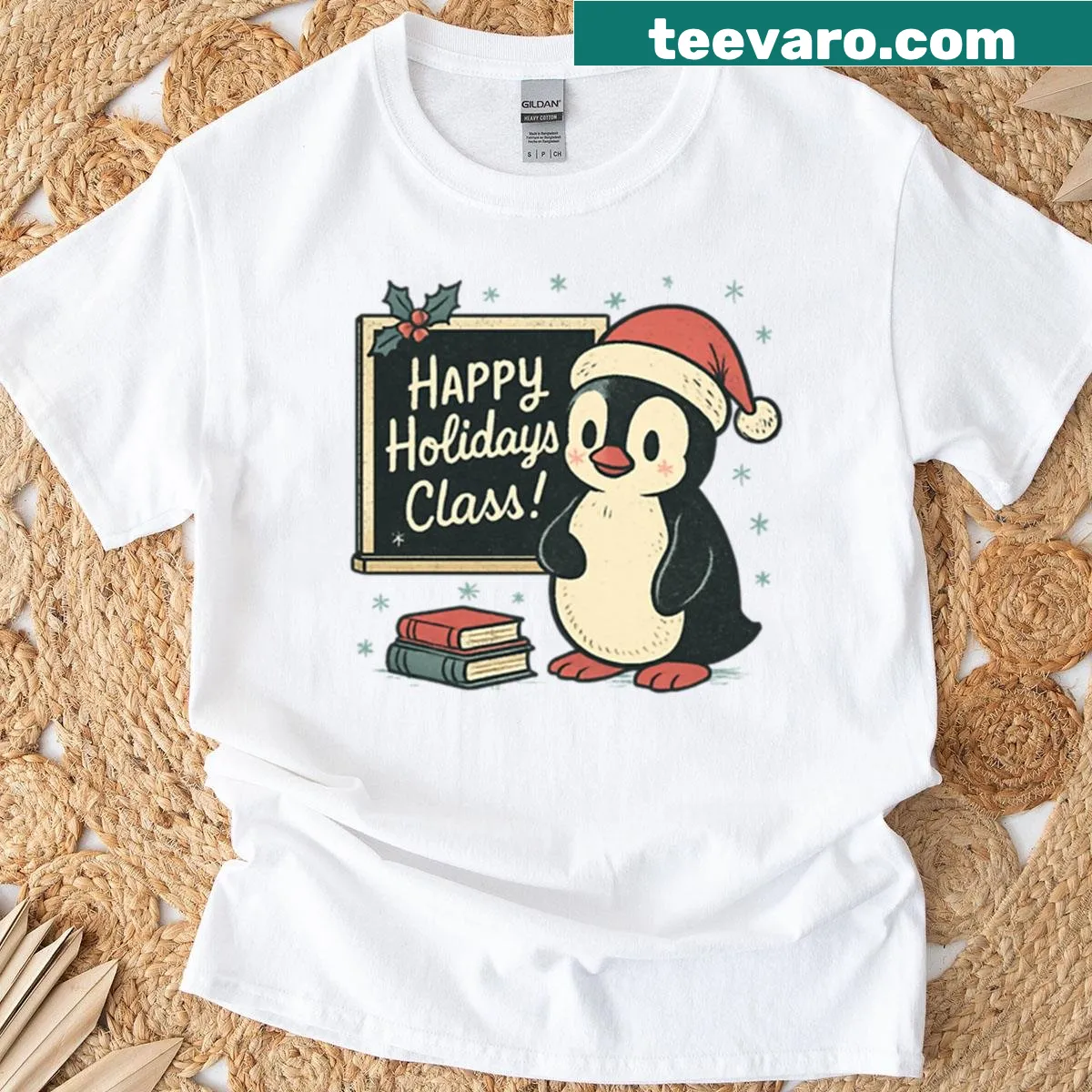 Christmas t-shirt featuring playful penguin design — on a men's t-shirt