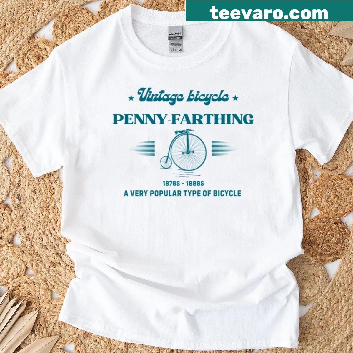 Oversized vintage penny-farthing bicycle graphic T-shirt — on a men's t-shirt