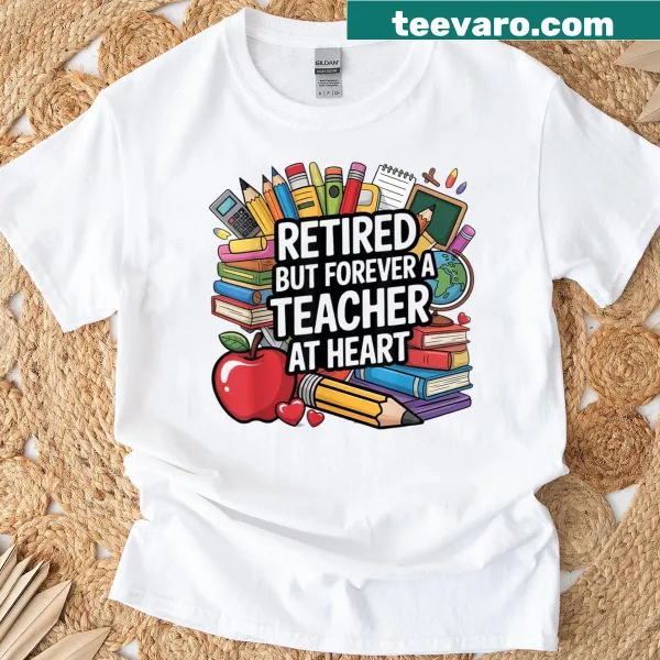 Typography shirt reading 'Retired But Forever A Teacher At Heart.'