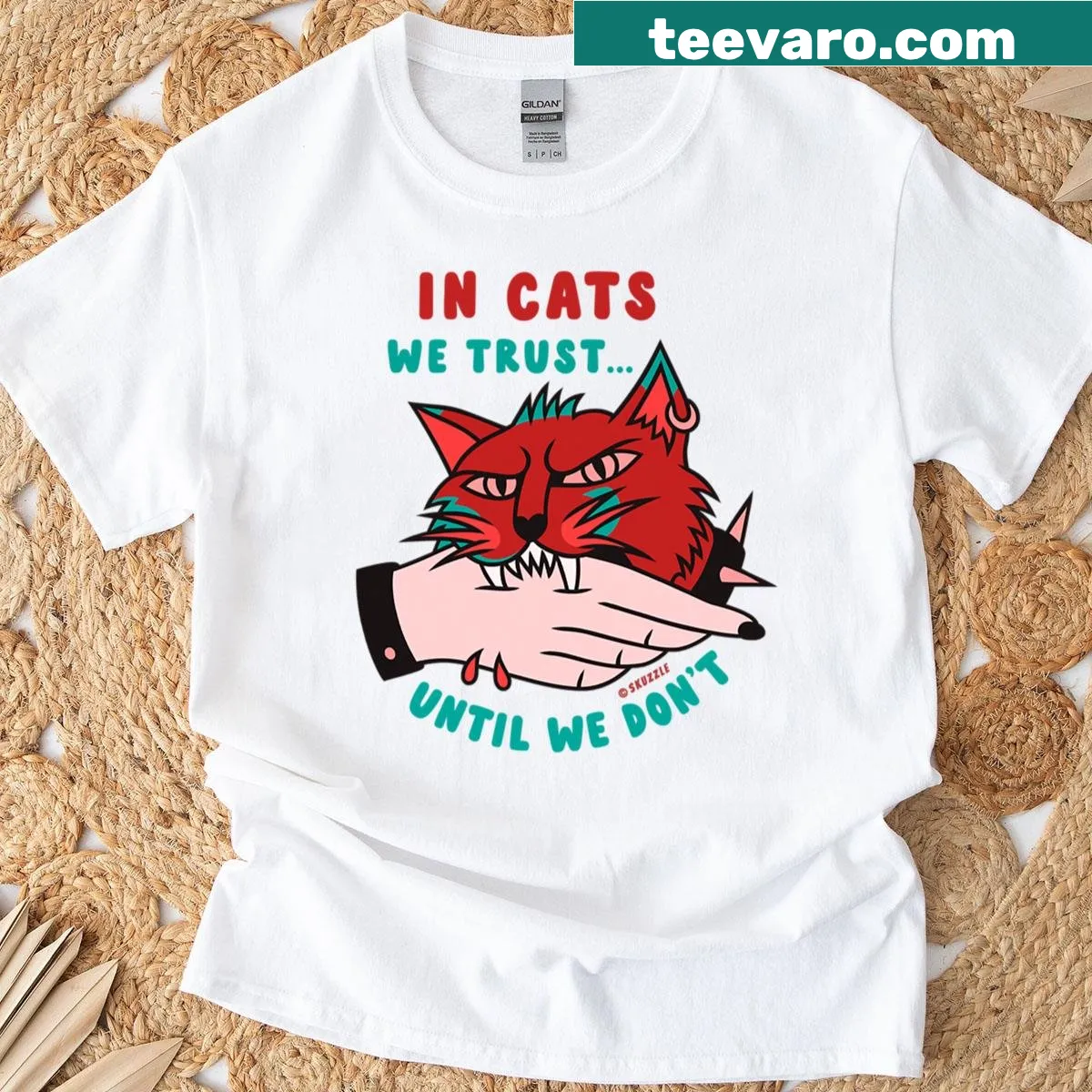 Comic-style cat bite graphic on oversized T-shirt — on a men's t-shirt
