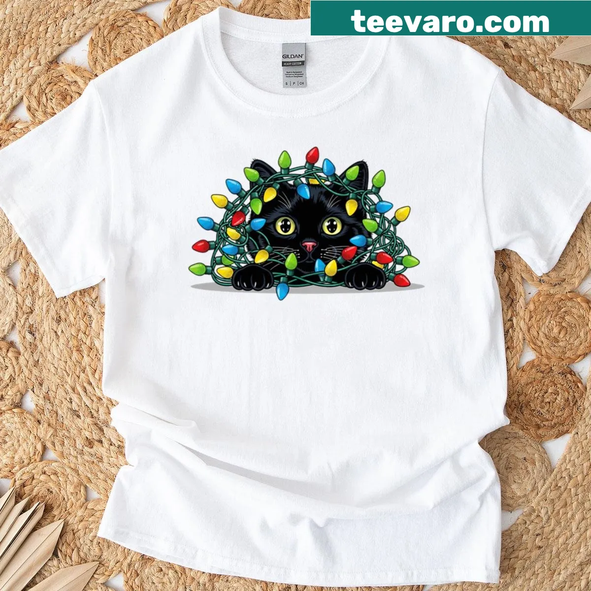 Vibrant pop art t-shirt featuring a black cat in Christmas lights — on a men's t-shirt