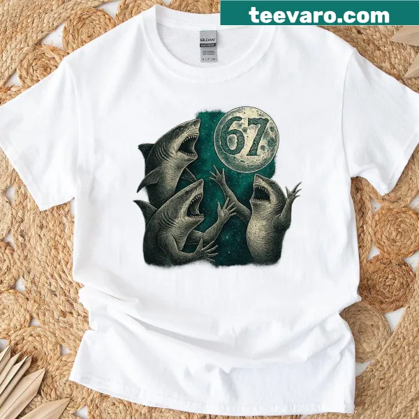 Whimsical graphic of dancing sharks under the moon on T-shirt