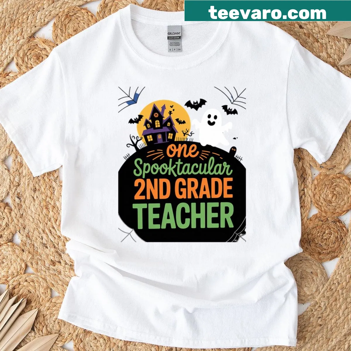 Halloween t-shirt for 2nd grade teachers with playful spooky graphics — on a men's t-shirt