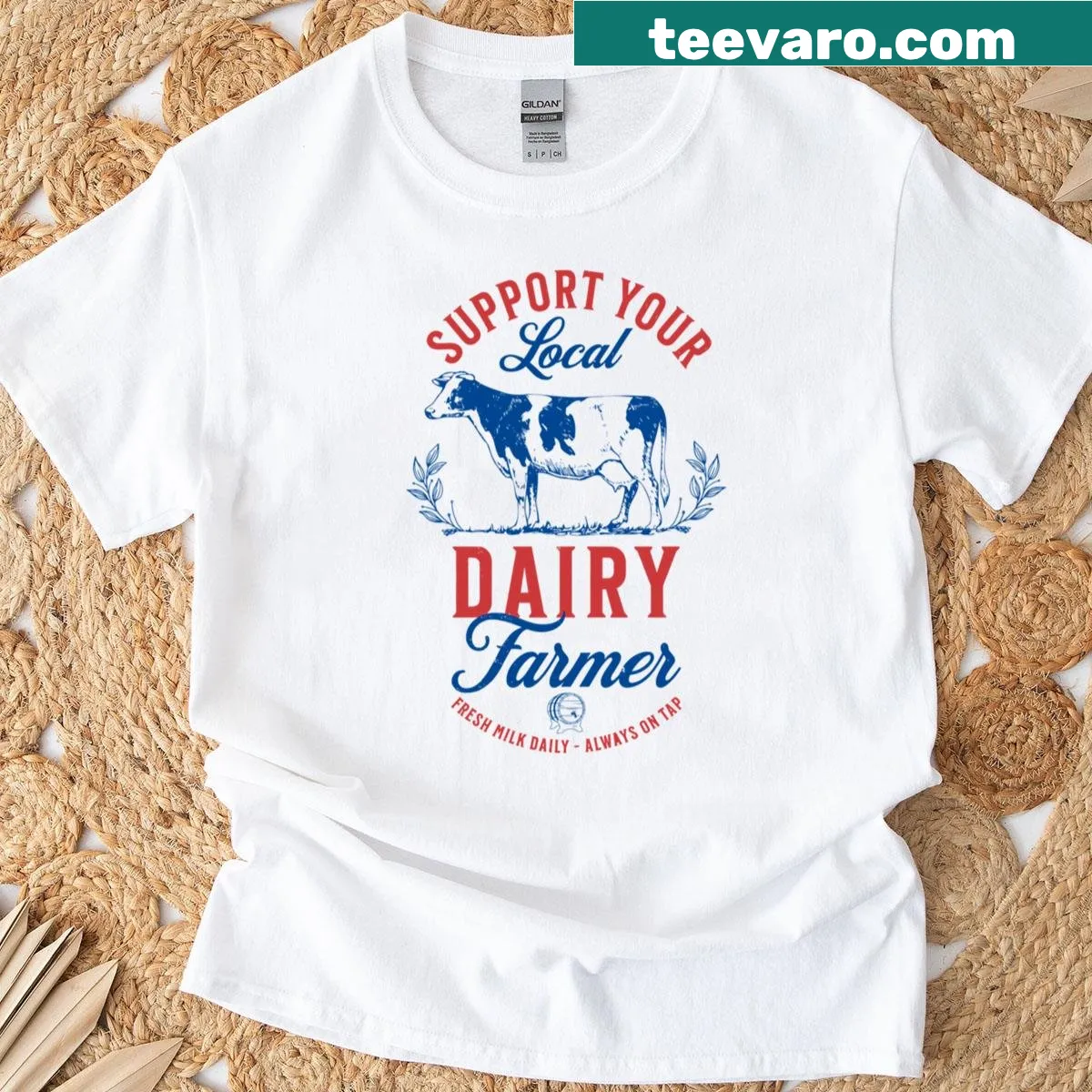 Typography t-shirt supporting local dairy farmers and breastfeeding mothers — on a men's t-shirt