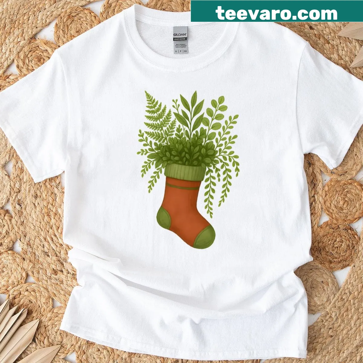 Botanical Christmas stocking t-shirt with plant designs for the holidays — on a men's t-shirt