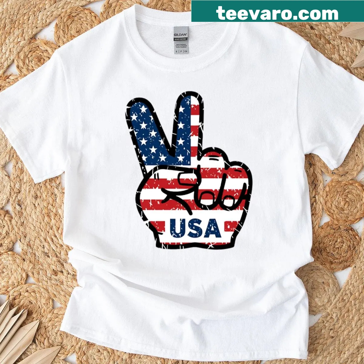 Vintage T-shirt with peace sign fingers and USA flag graphic. — on a men's t-shirt