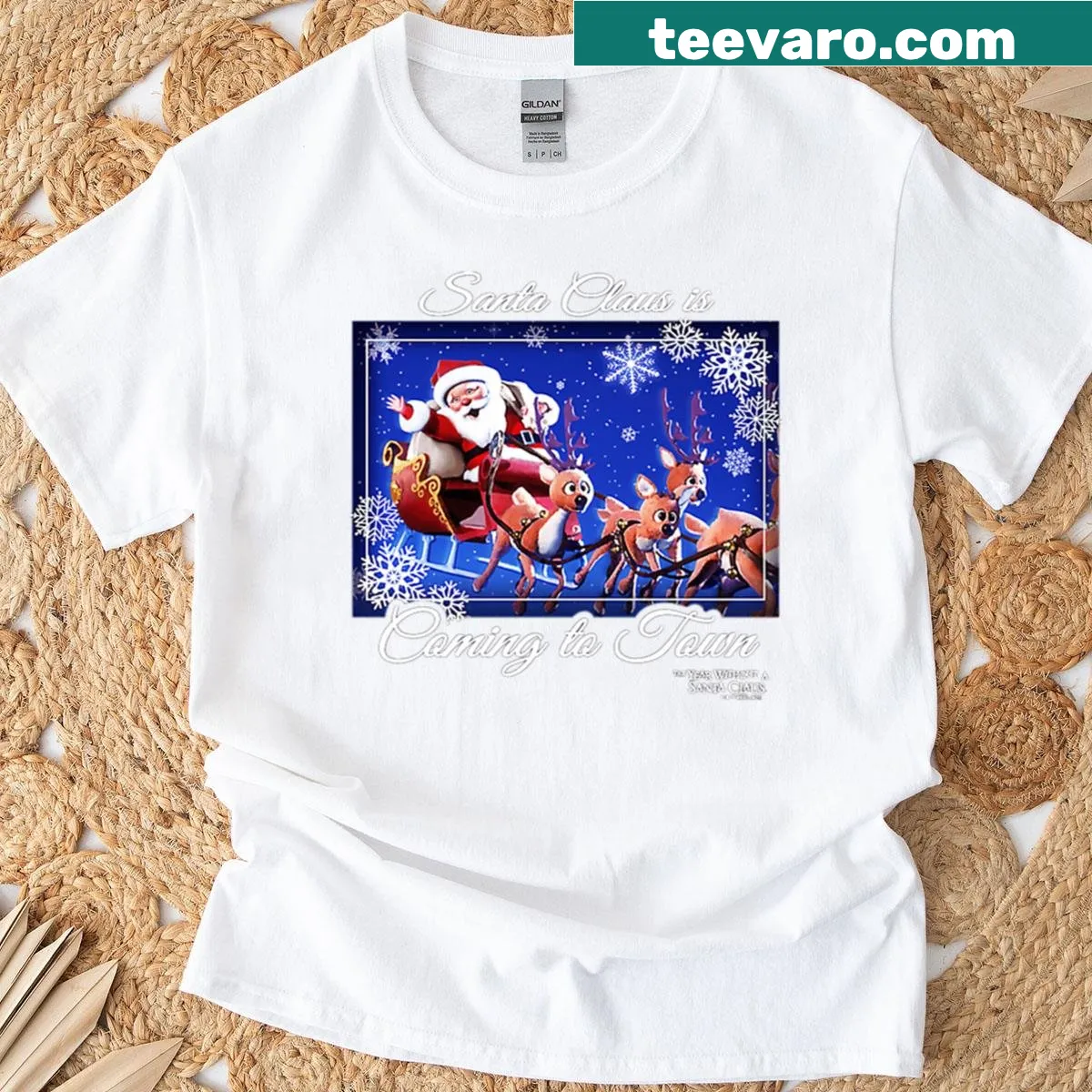 Santa in sleigh in winter scene graphic on t-shirt — on a men's t-shirt