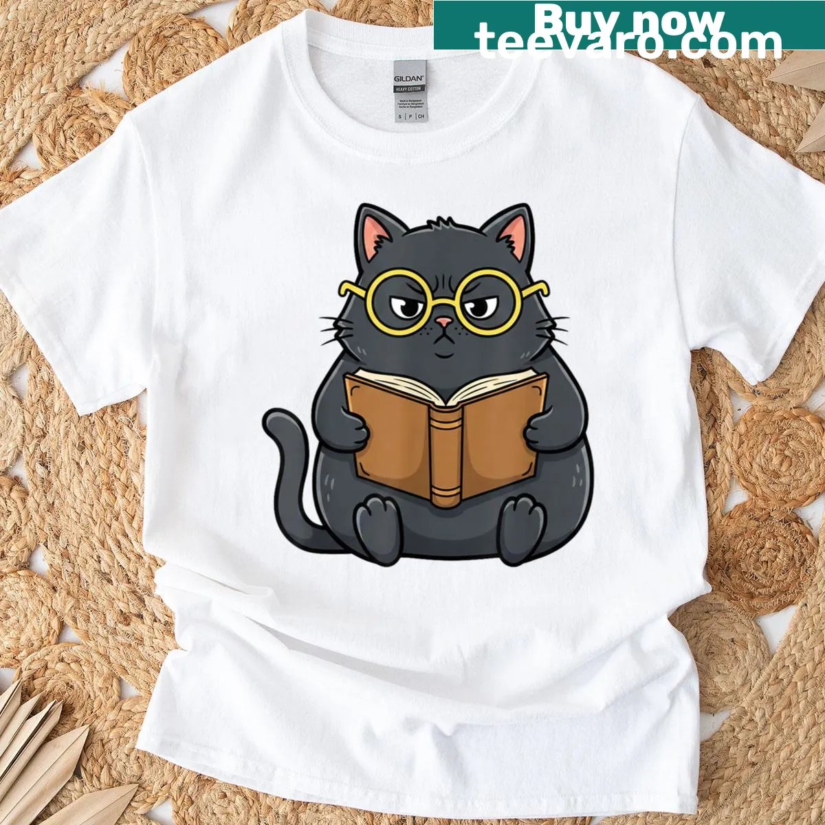 Illustration of a cat reading a book on a t-shirt — on a men's t-shirt