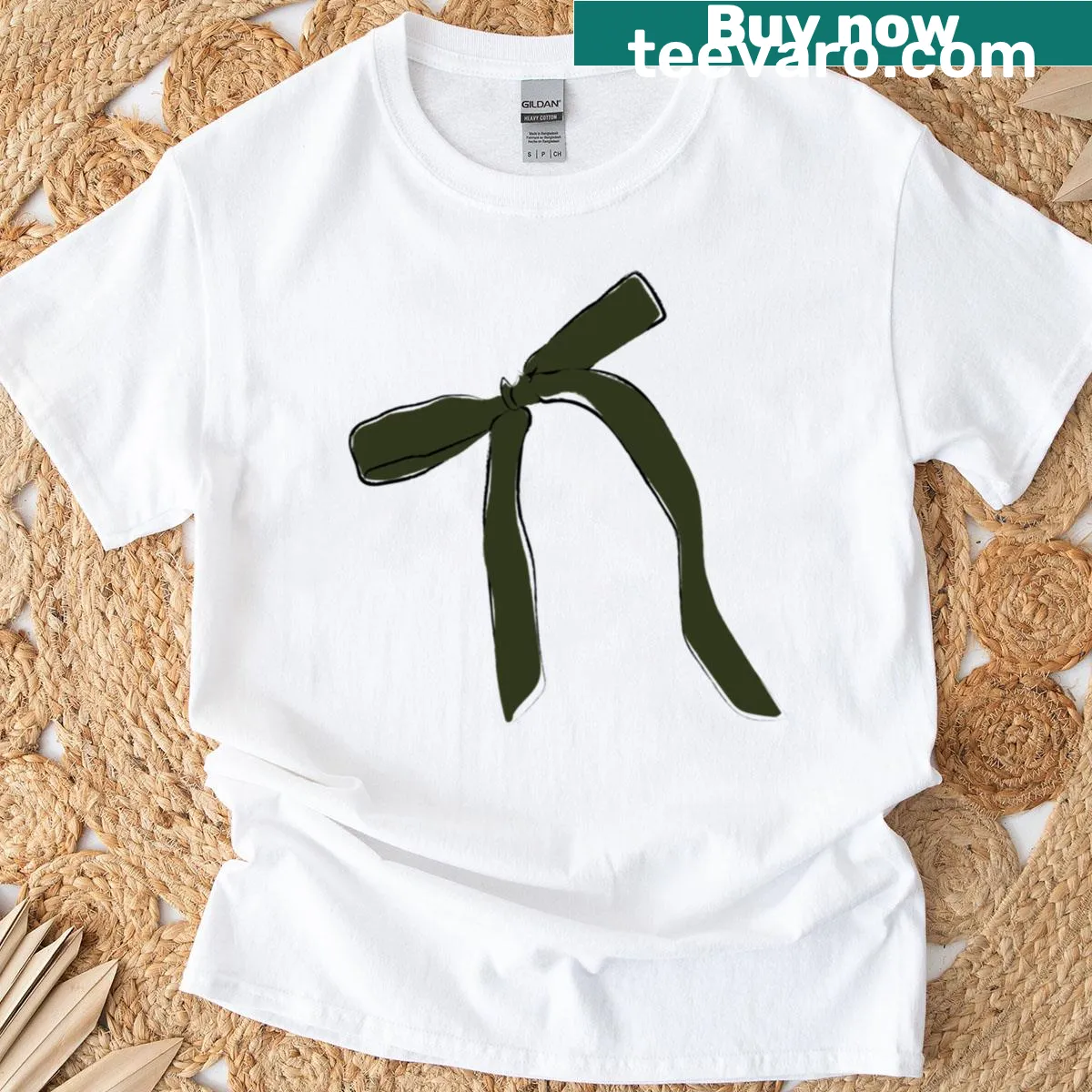 Hand-lettered green bow graphic t-shirt — on a men's t-shirt