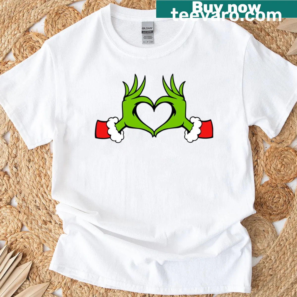Grinch making heart hands design for Christmas — on a men's t-shirt