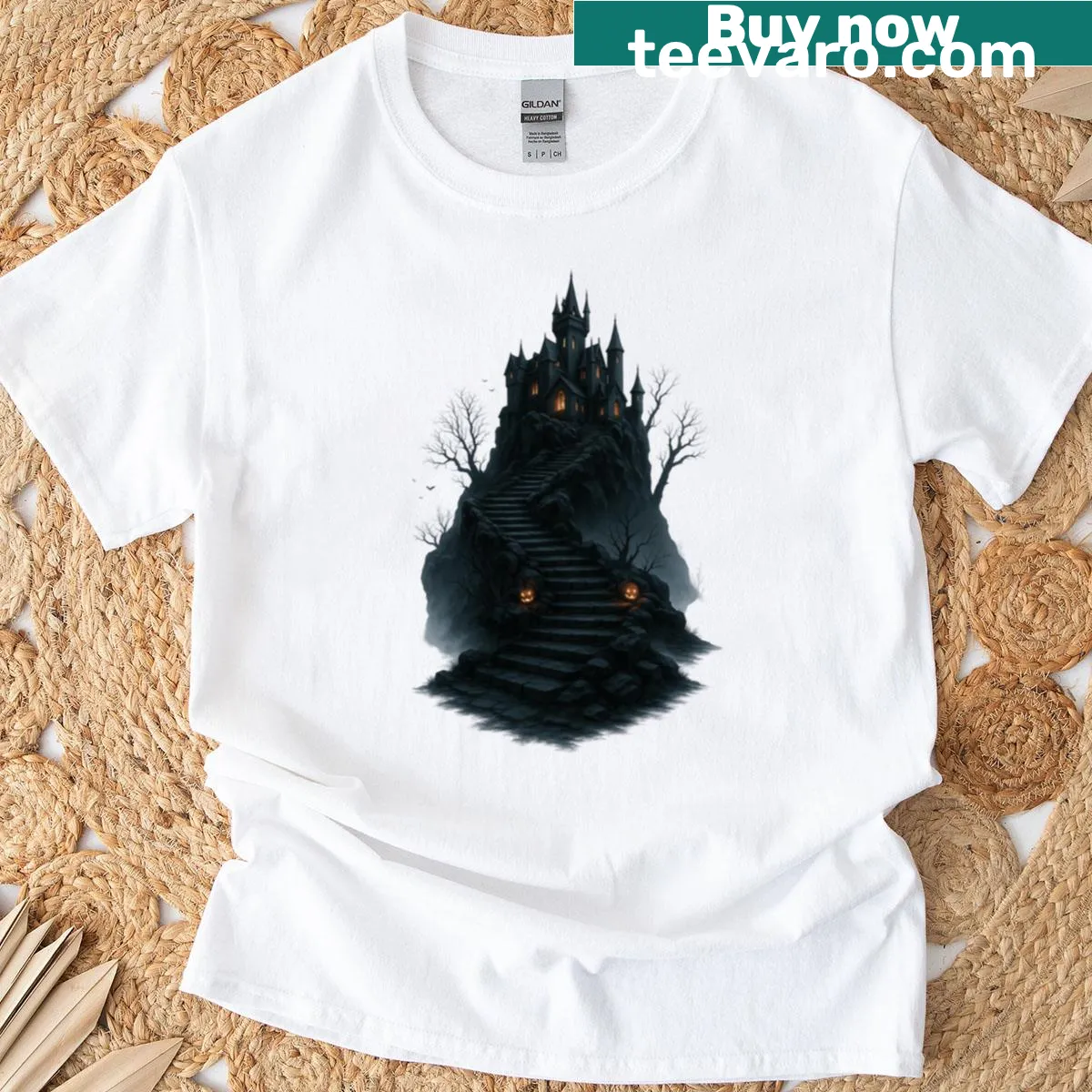 Illustrative T-shirt featuring a hauntingly twisted tree — on a men's t-shirt