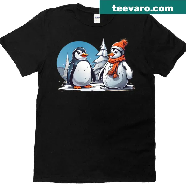 Cute penguin next to a snowman graphic on a T-shirt