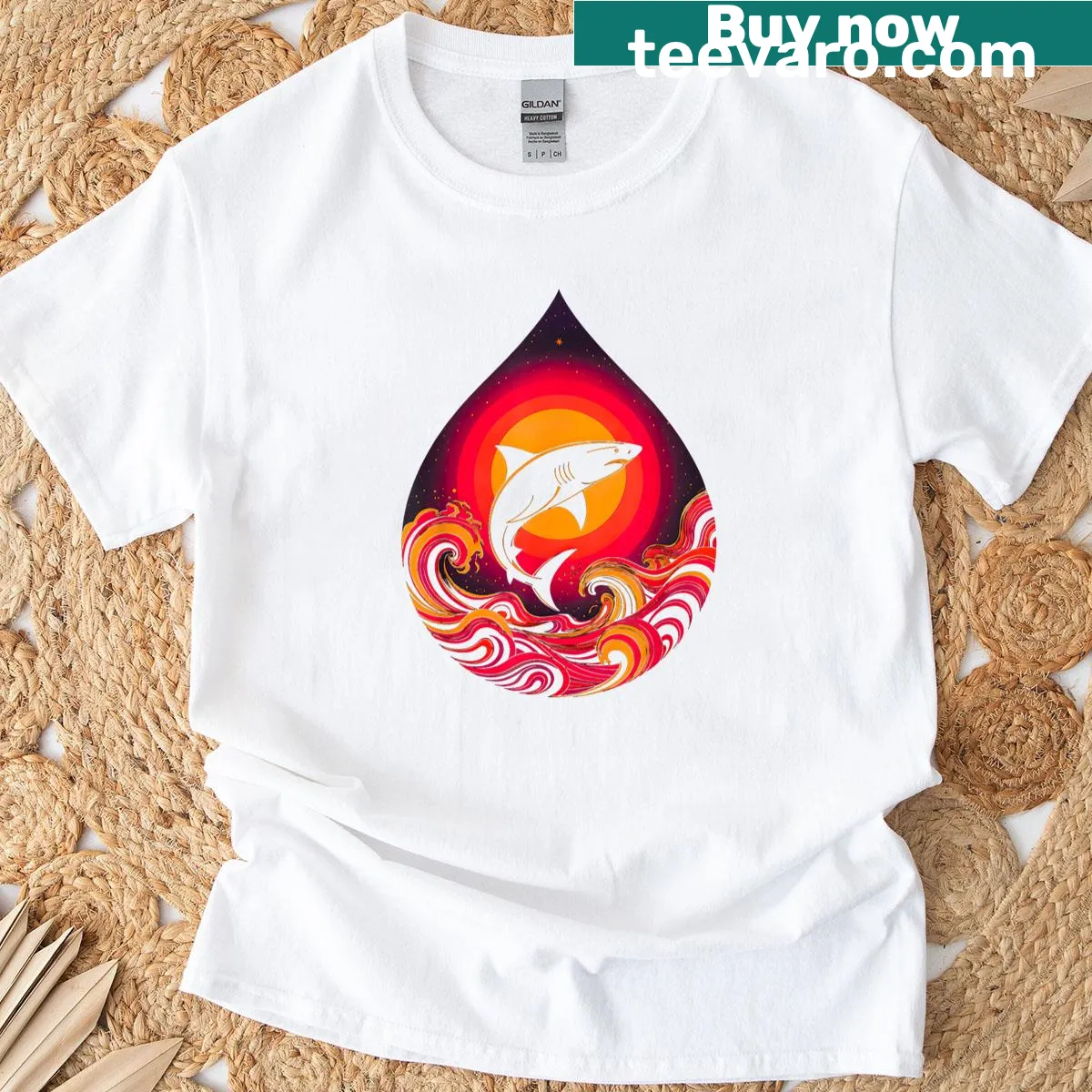 Shark graphic T-shirt with retro surf art featuring ocean waves — on a men's t-shirt