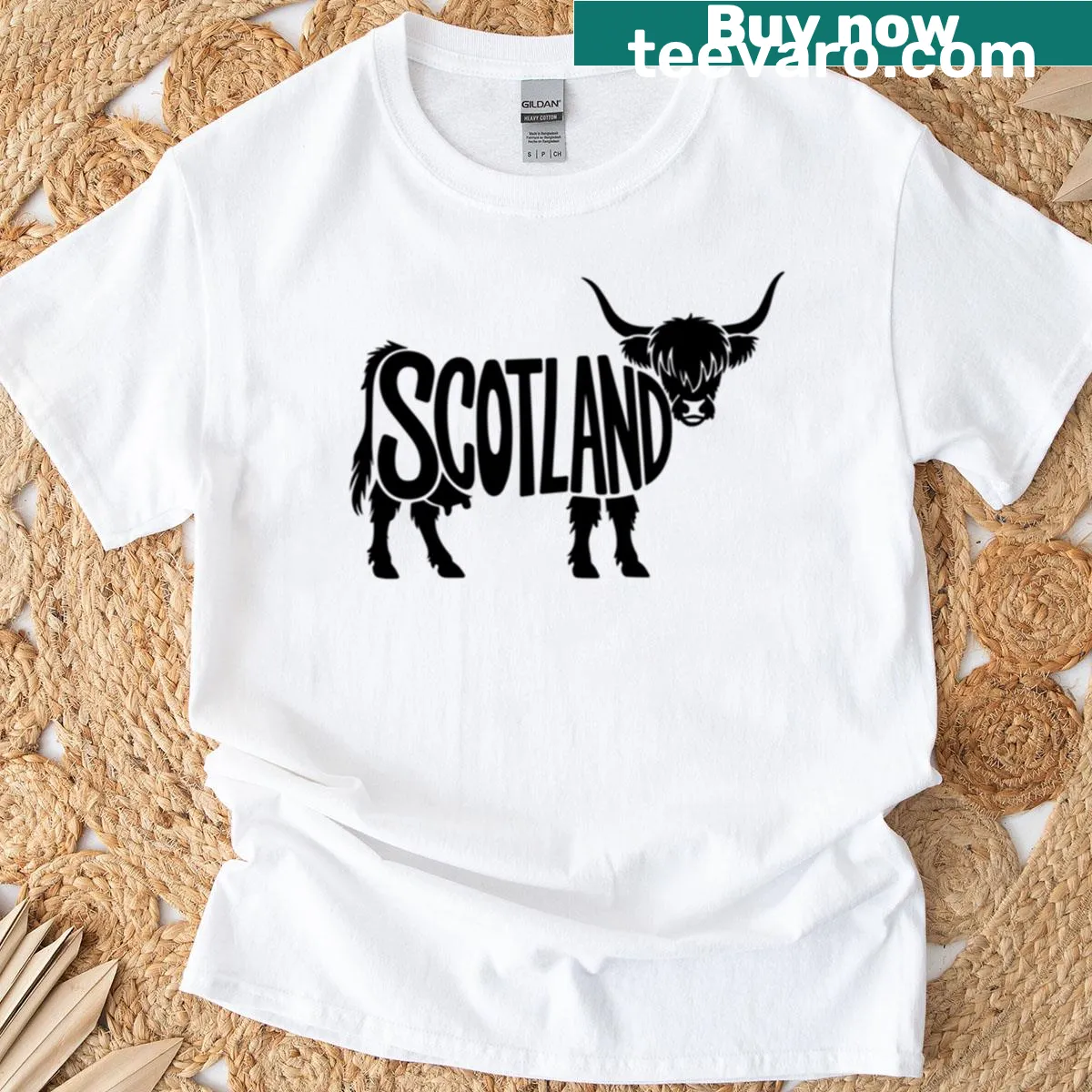 Illustration of a Scottish cow on a souvenir t-shirt — on a men's t-shirt