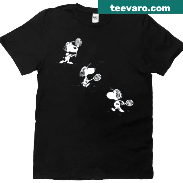 T-shirt featuring cartoon Snoopy playing tennis in a humorous design
