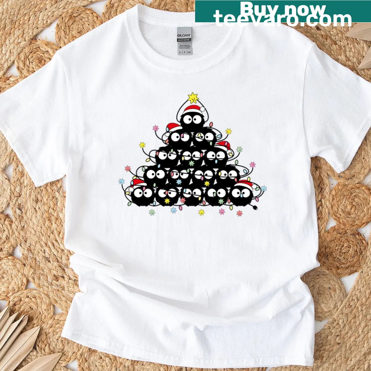 Oversized tee with Soot Sprites and Christmas tree illustration. — on a men's t-shirt