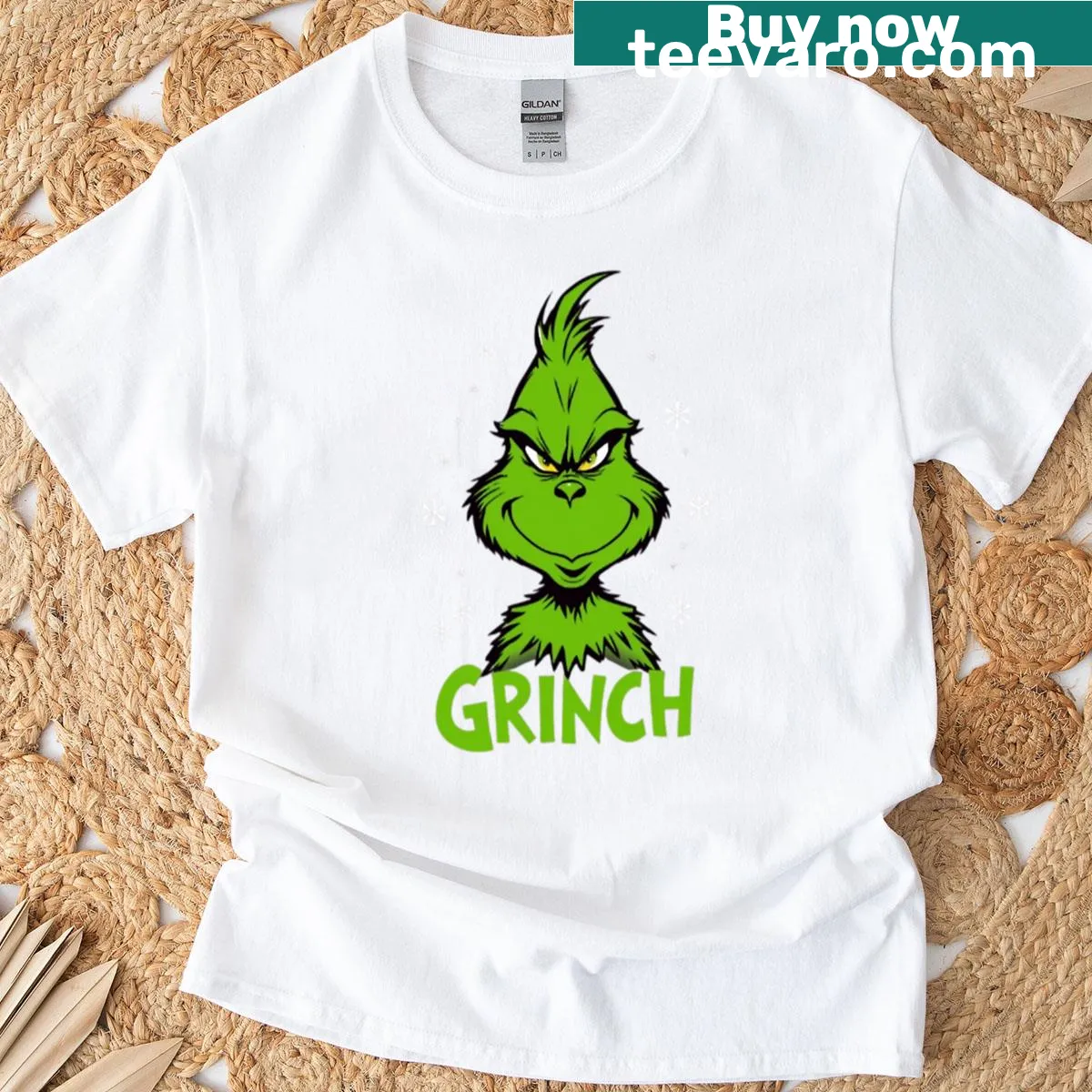 Illustrative t-shirt featuring The Grinch character — on a men's t-shirt