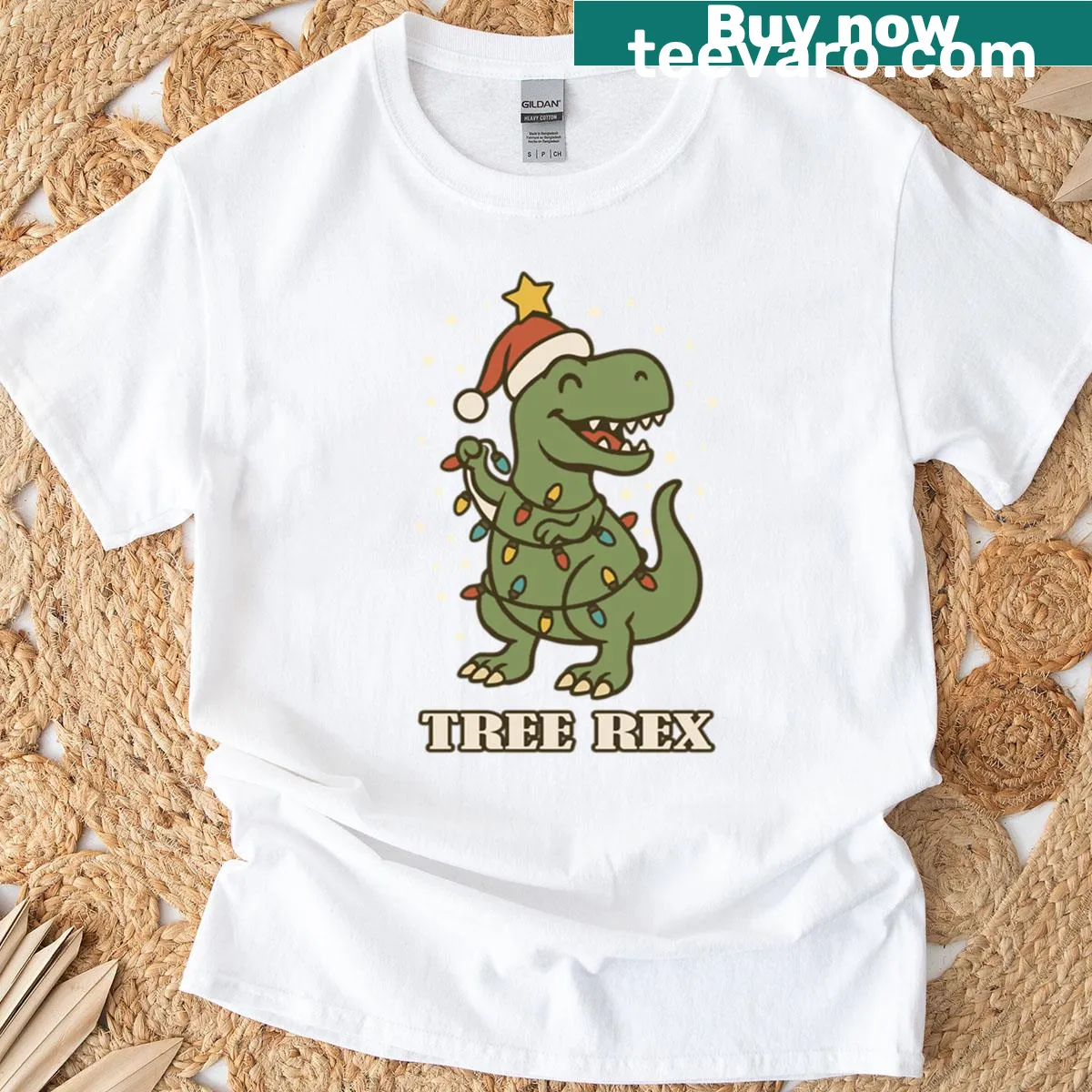 Cute T-rex wrapped in Christmas lights design on T-shirt — on a men's t-shirt