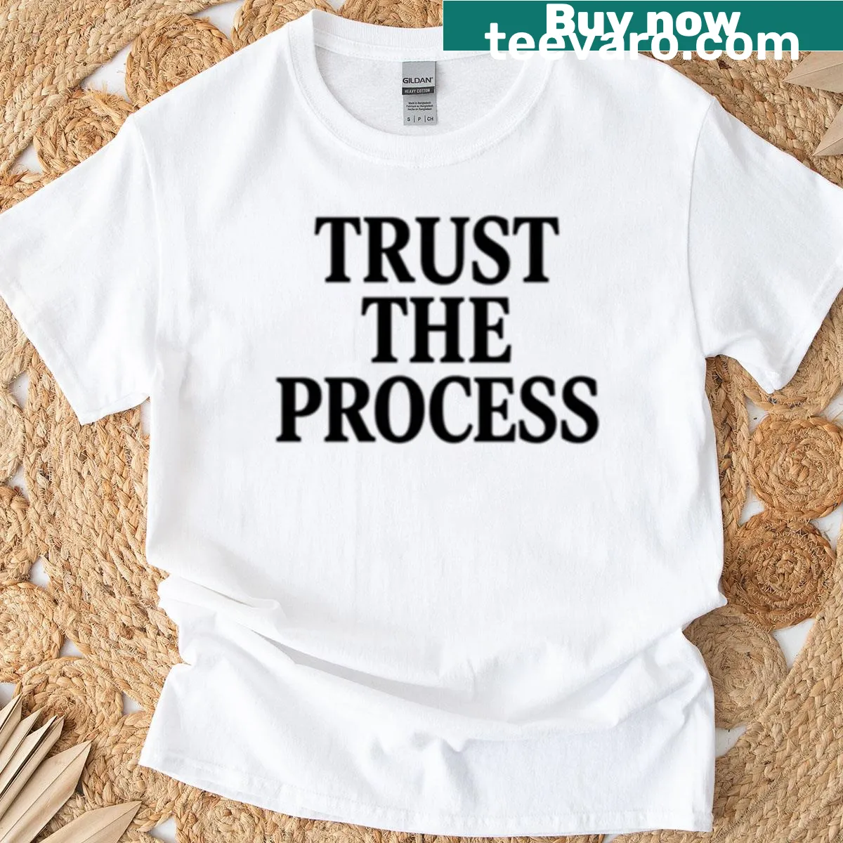 Minimalist motivational quote t-shirt with 'Trust The Process' text — on a men's t-shirt