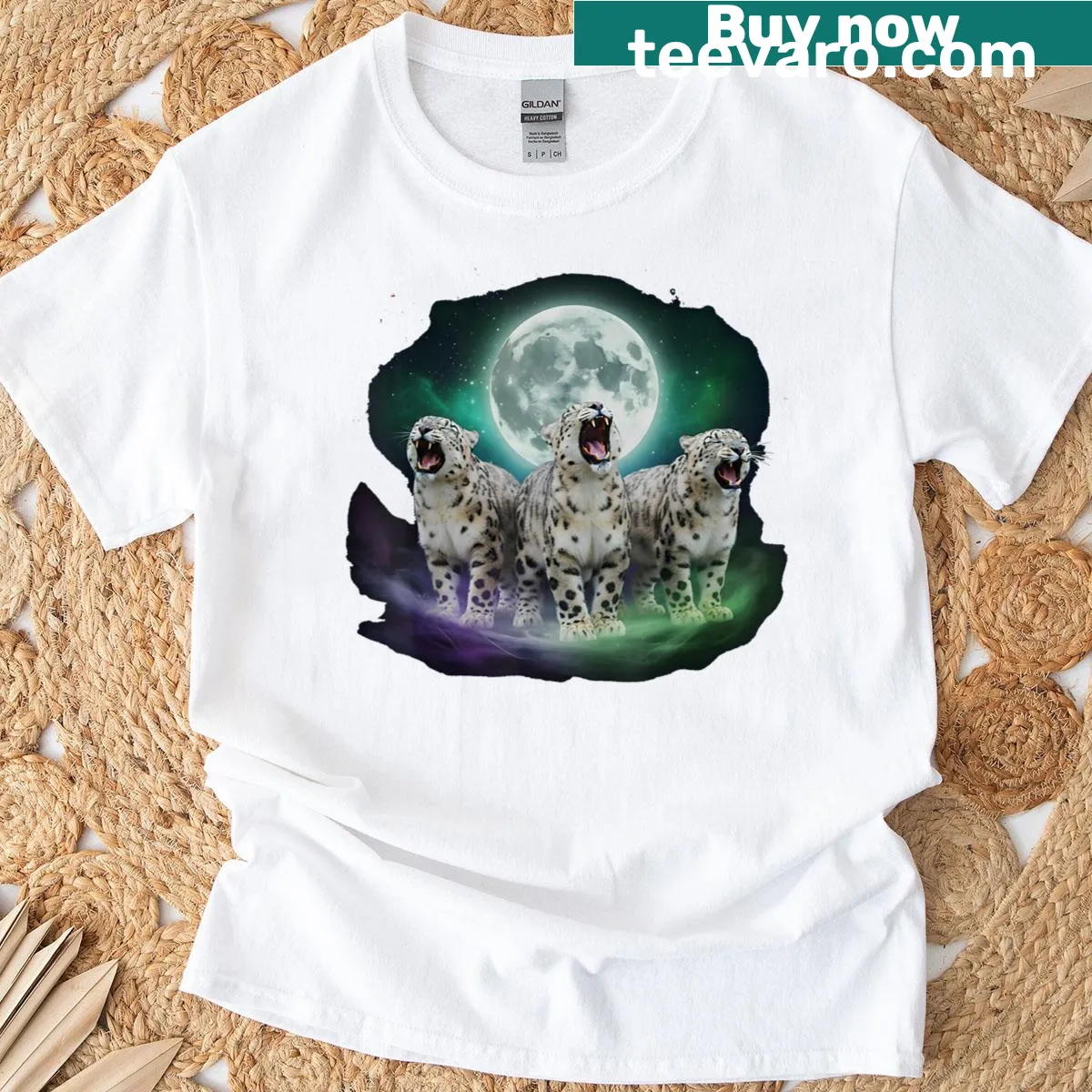 Artistic graphic of snow leopards howling at the moon on a t-shirt. — on a men's t-shirt