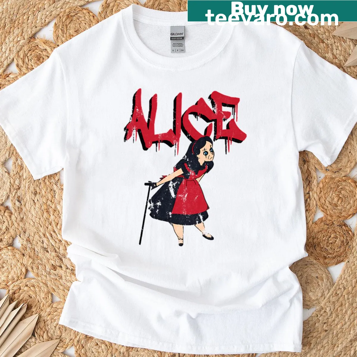 Graphic of Alice in Wonderland and Alice Cooper on a t-shirt. — on a men's t-shirt