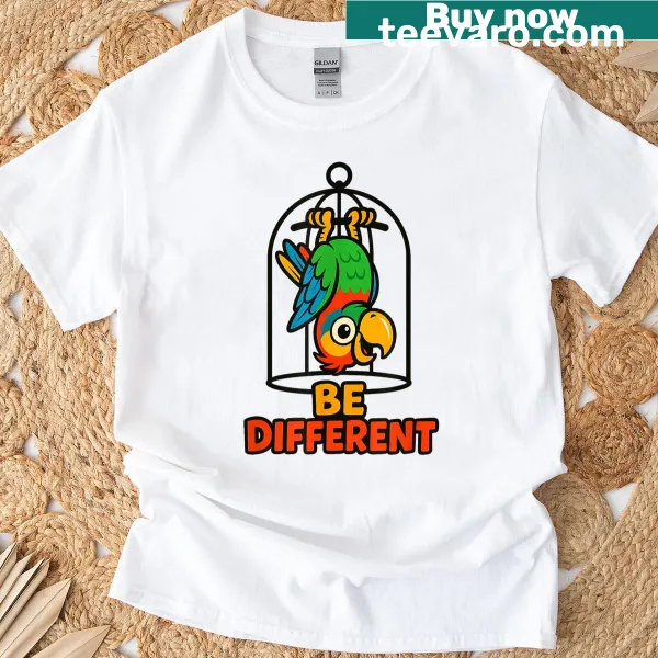 Playful parrot graphic promoting autism acceptance on a t-shirt.