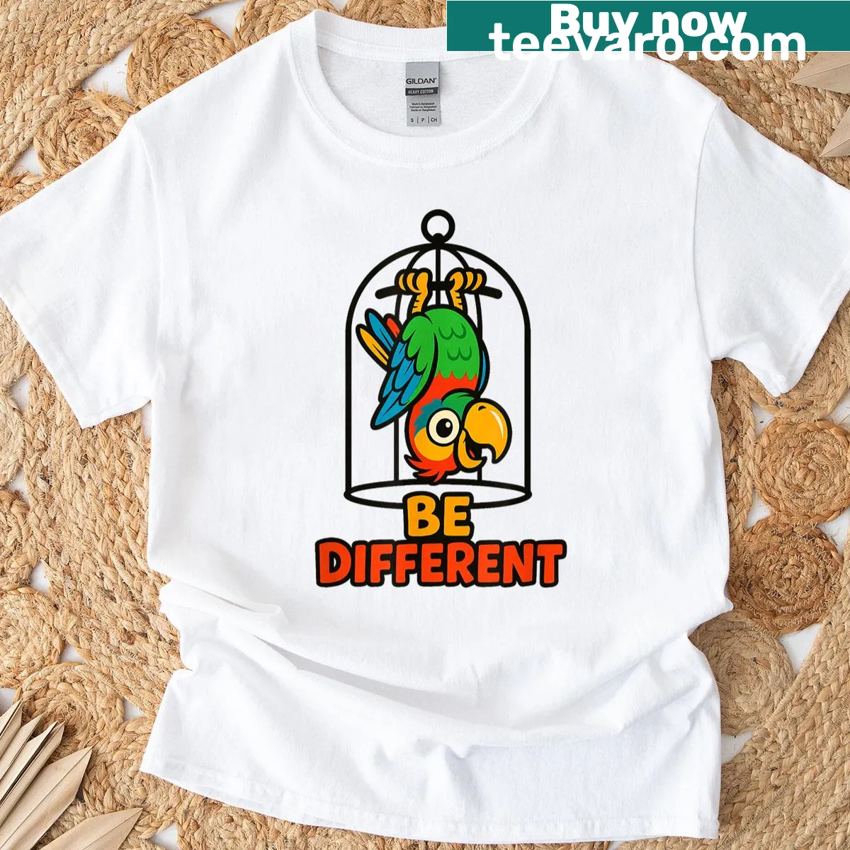 Playful parrot graphic promoting autism acceptance on a t-shirt. — on a men's t-shirt
