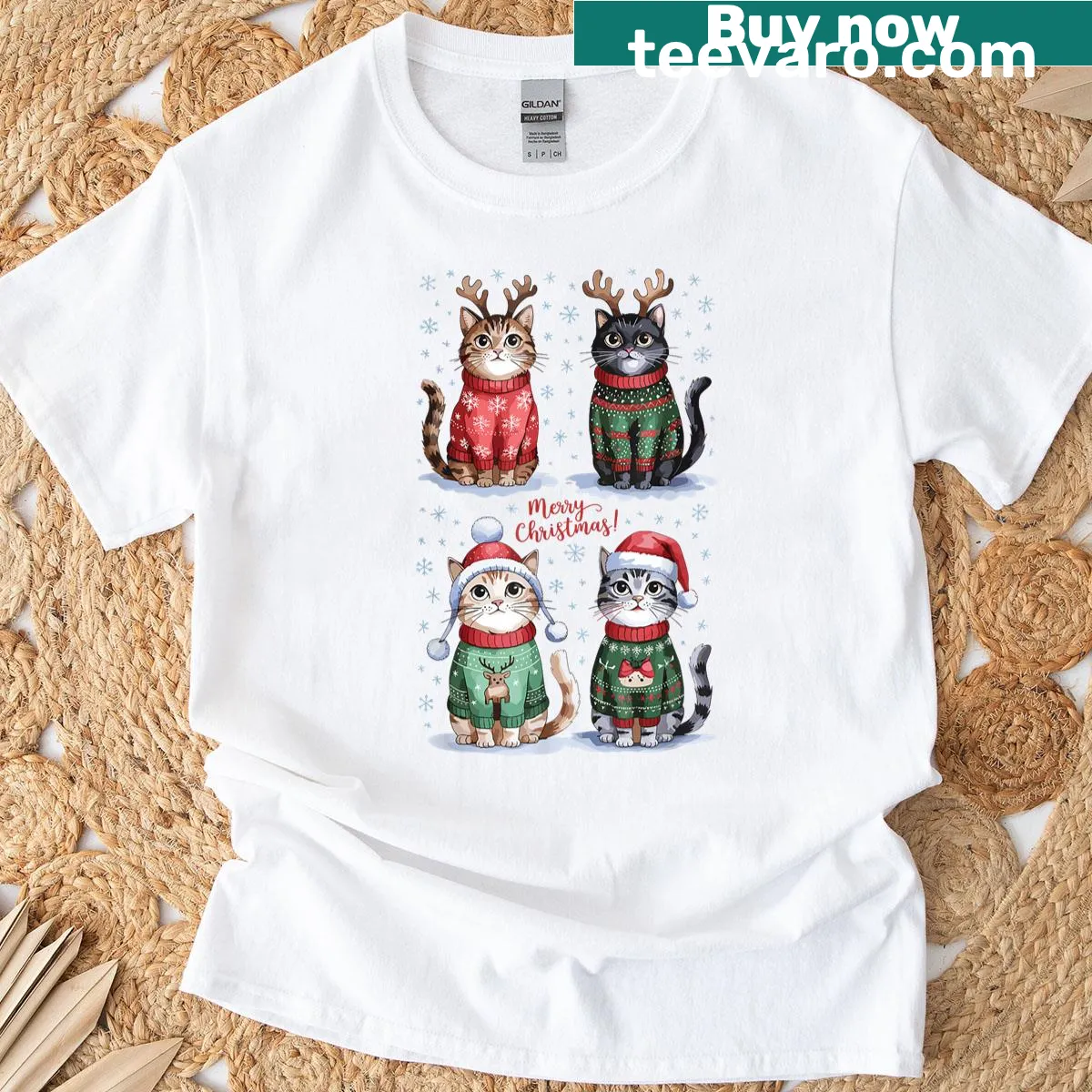 Festive T-shirt featuring Christmas-themed graphic of playful cats — on a men's t-shirt