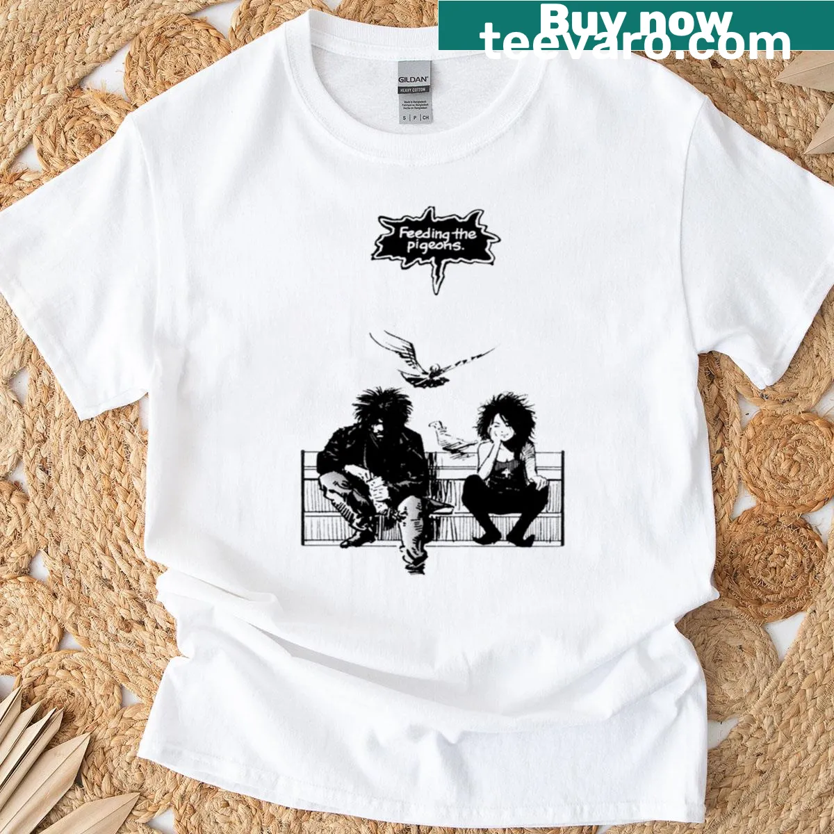 T-shirt featuring a wholesome illustration of feeding pigeons — on a men's t-shirt