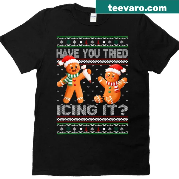 Funny gingerbread-themed nurse Christmas t-shirt with playful text.