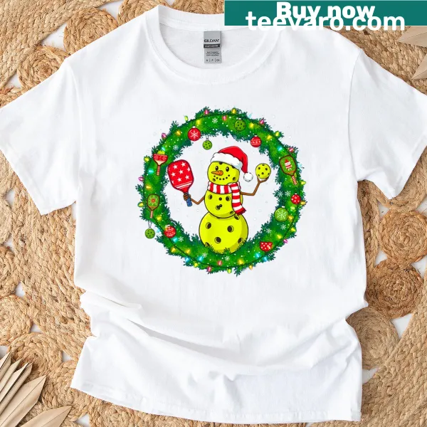 Whimsical Christmas T-shirt with snowman and pickleball theme