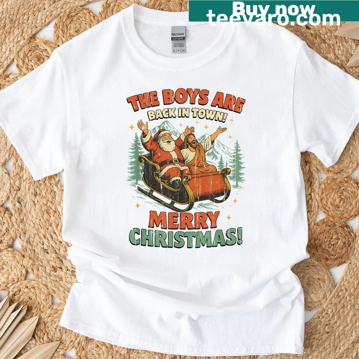 Christmas T-shirt with 'The Boys Are Back In Town' printed text — on a men's t-shirt