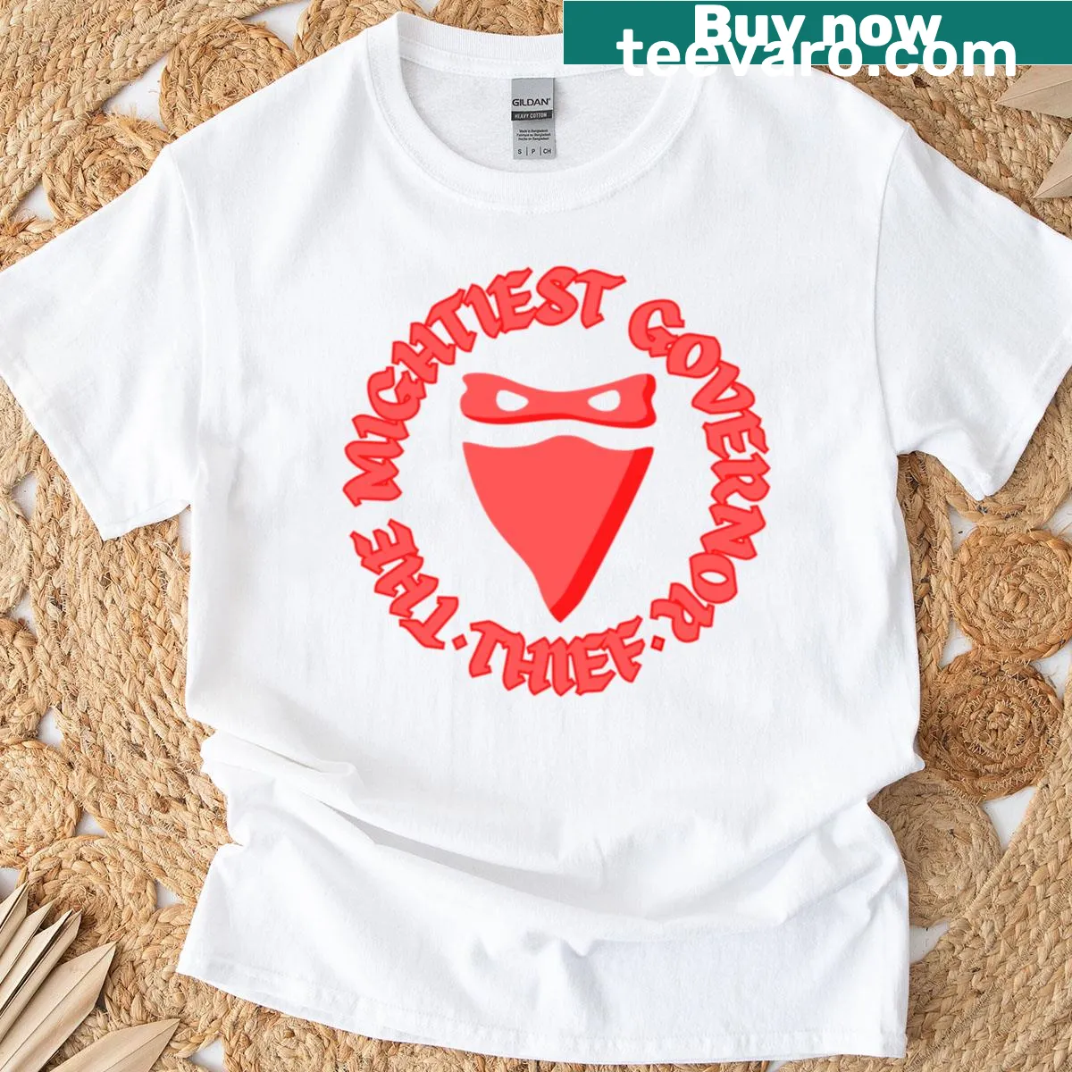 Funny T-shirt with 'The Mightiest Governor Thief' text — on a men's t-shirt
