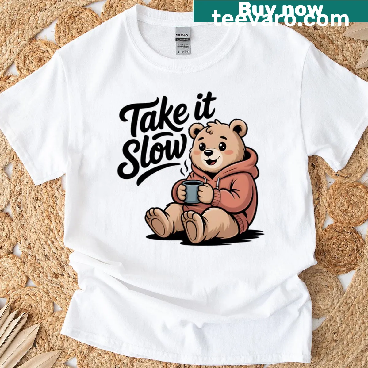 Illustrated t-shirt of a cozy bear with a warm drink — on a men's t-shirt