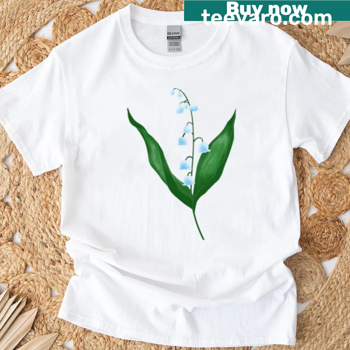 Botanical design T-shirt featuring delicate lilies of the valley — on a men's t-shirt