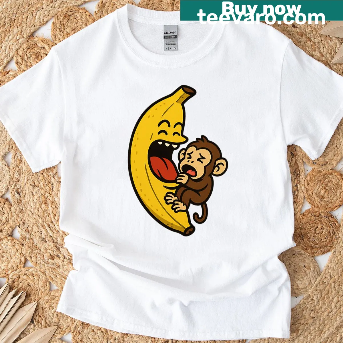 Playful monkey eating a banana graphic T-shirt — on a men's t-shirt